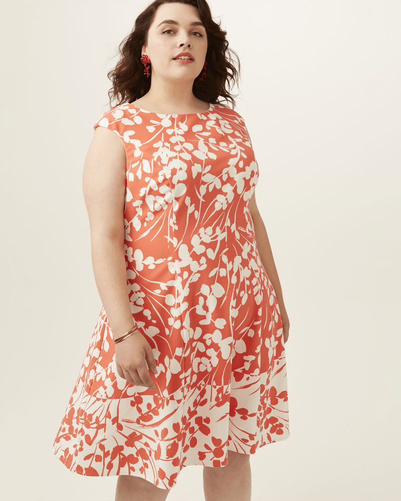 Front of 5'10" model wearing a plus size Ava Fit & Flare Dress in Coral / White by Adorne. | dia_product_style_image_id:273798